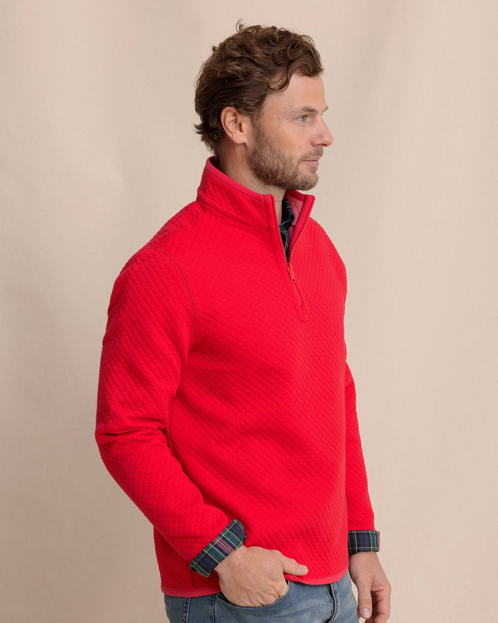 The side view of the Southern Tide Oak Island Reversible Quarter Zip by Southern Tide - Grenadine Red