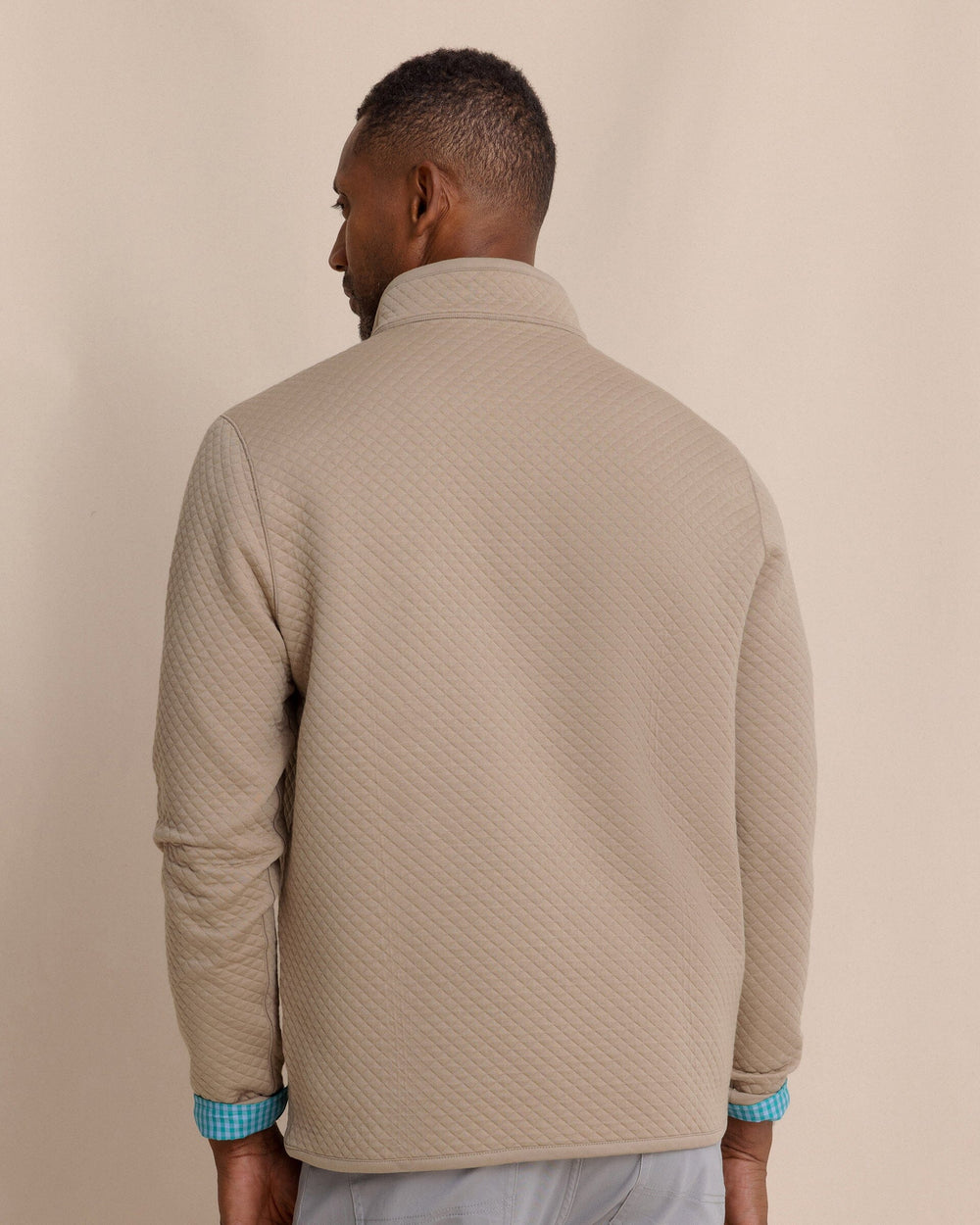 The back view of the Southern Tide Oak Island Reversible Quarter Zip by Southern Tide - Sandstone Khaki