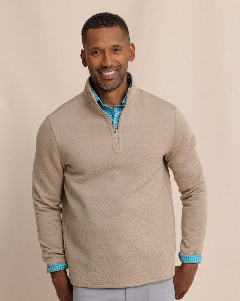 The front view of the Southern Tide Oak Island Reversible Quarter Zip by Southern Tide - Sandstone Khaki
