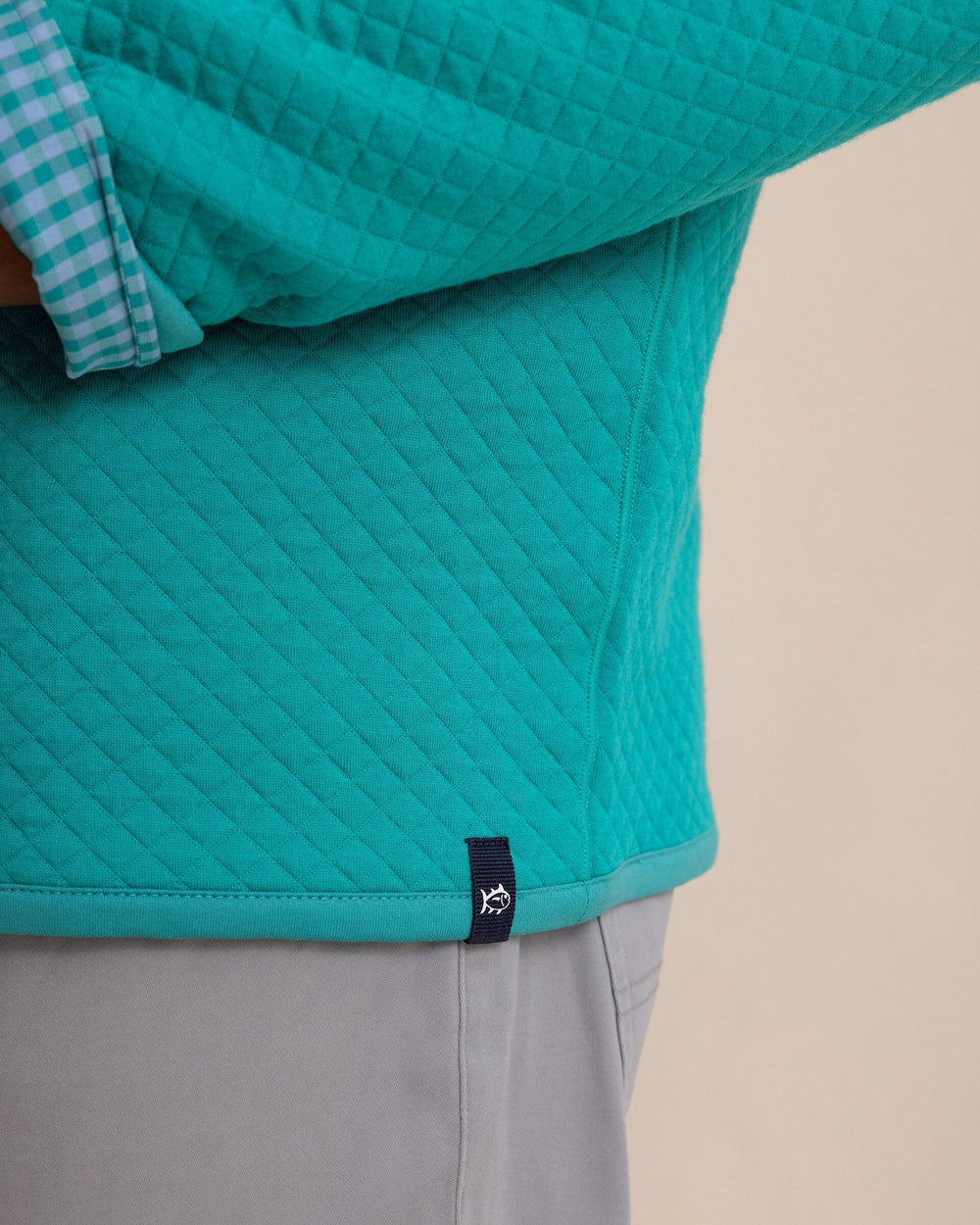 The detail view of the Southern Tide Oak Island Reversible Quarter Zip by Southern Tide - Spruce Shade
