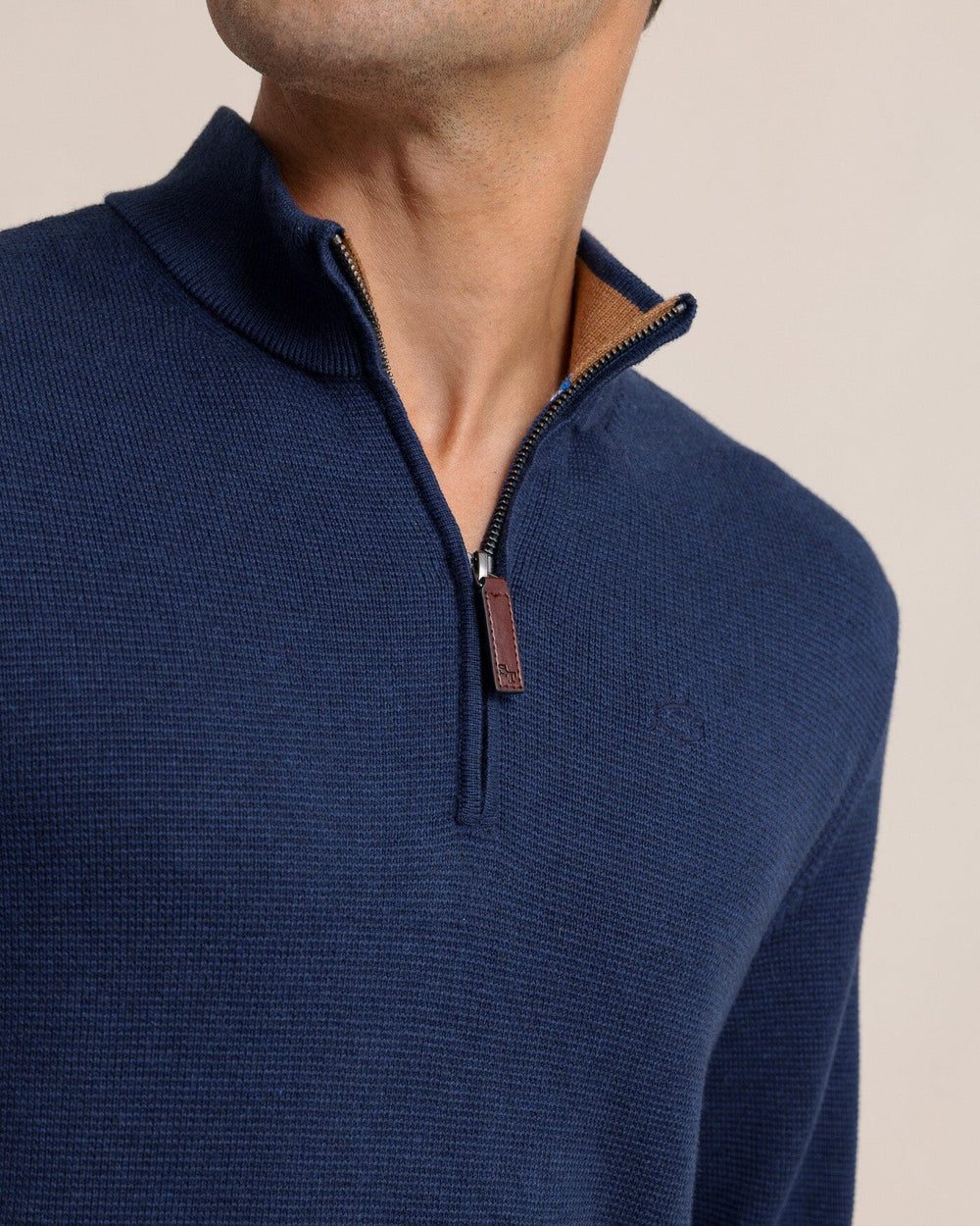 The detail view of the Southern Tide Oakatie Heather Quarter Zip Sweater by Southern Tide - Heather Dress Blue