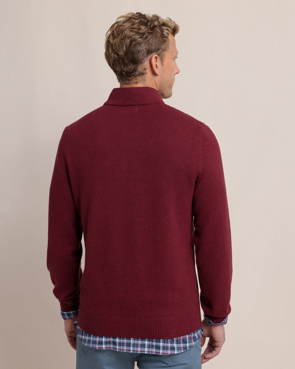 The back view of the Southern Tide Oakatie Heather Quarter Zip Sweater by Southern Tide - Heather Muscadine