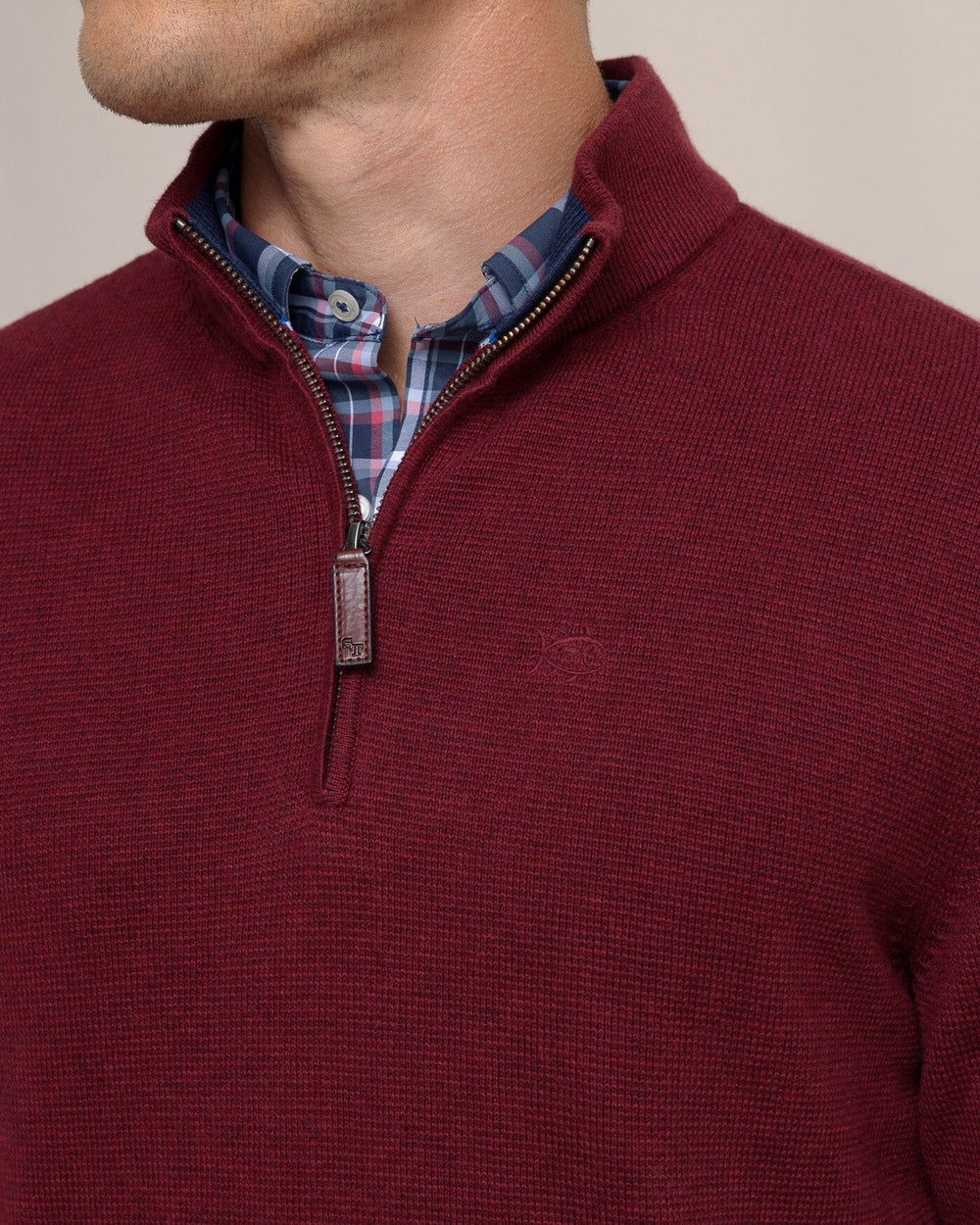 The detail view of the Southern Tide Oakatie Heather Quarter Zip Sweater by Southern Tide - Heather Muscadine