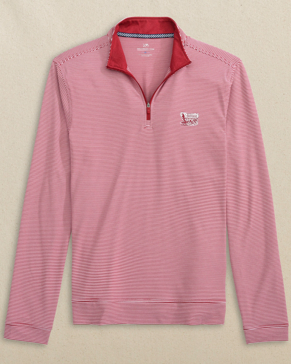 The front view of the Southern Tide Oklahoma Sooner Schooner Cruiser Micro-Stripe Heather Quarter Zip by Southern Tide - Heather Crimson