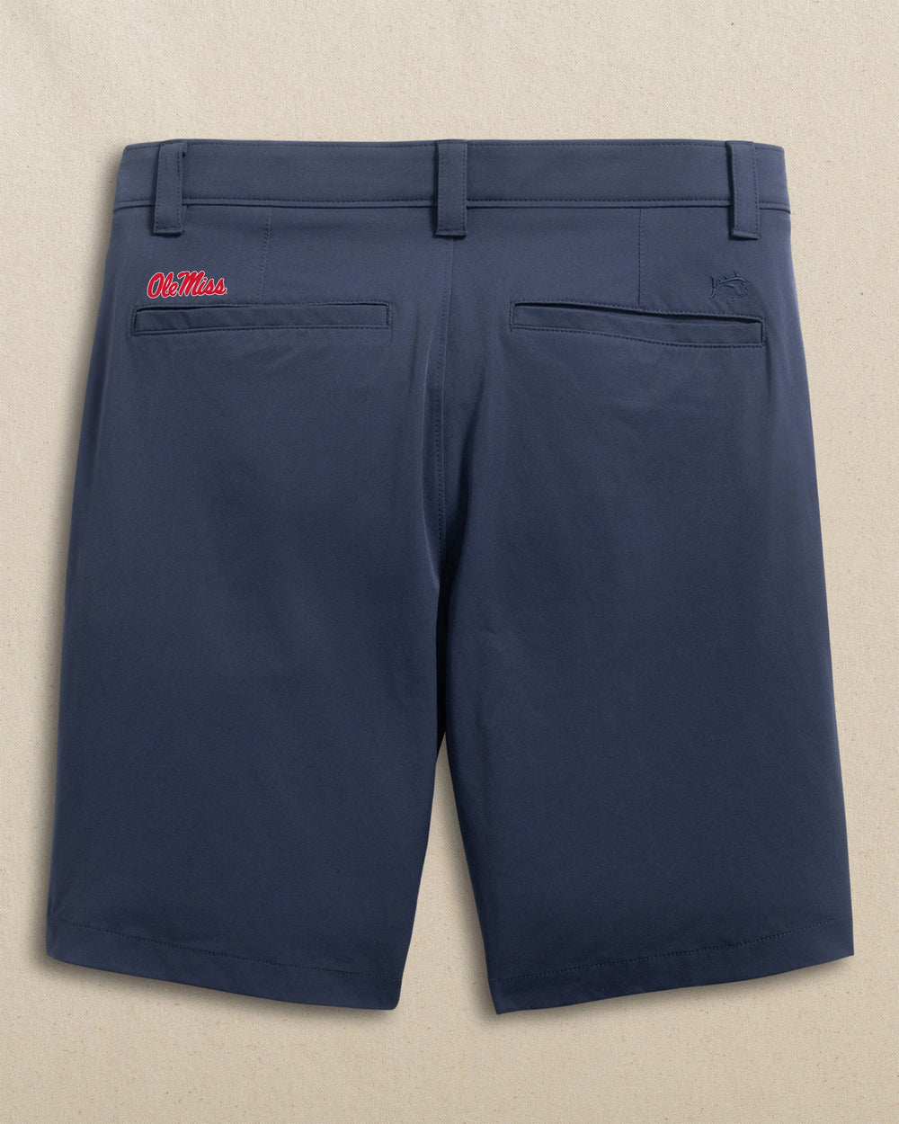 The back view of the Southern Tide Ole Miss Rebels Birdie 8" Coastal Breeze® Performance Short by Southern Tide - True Navy