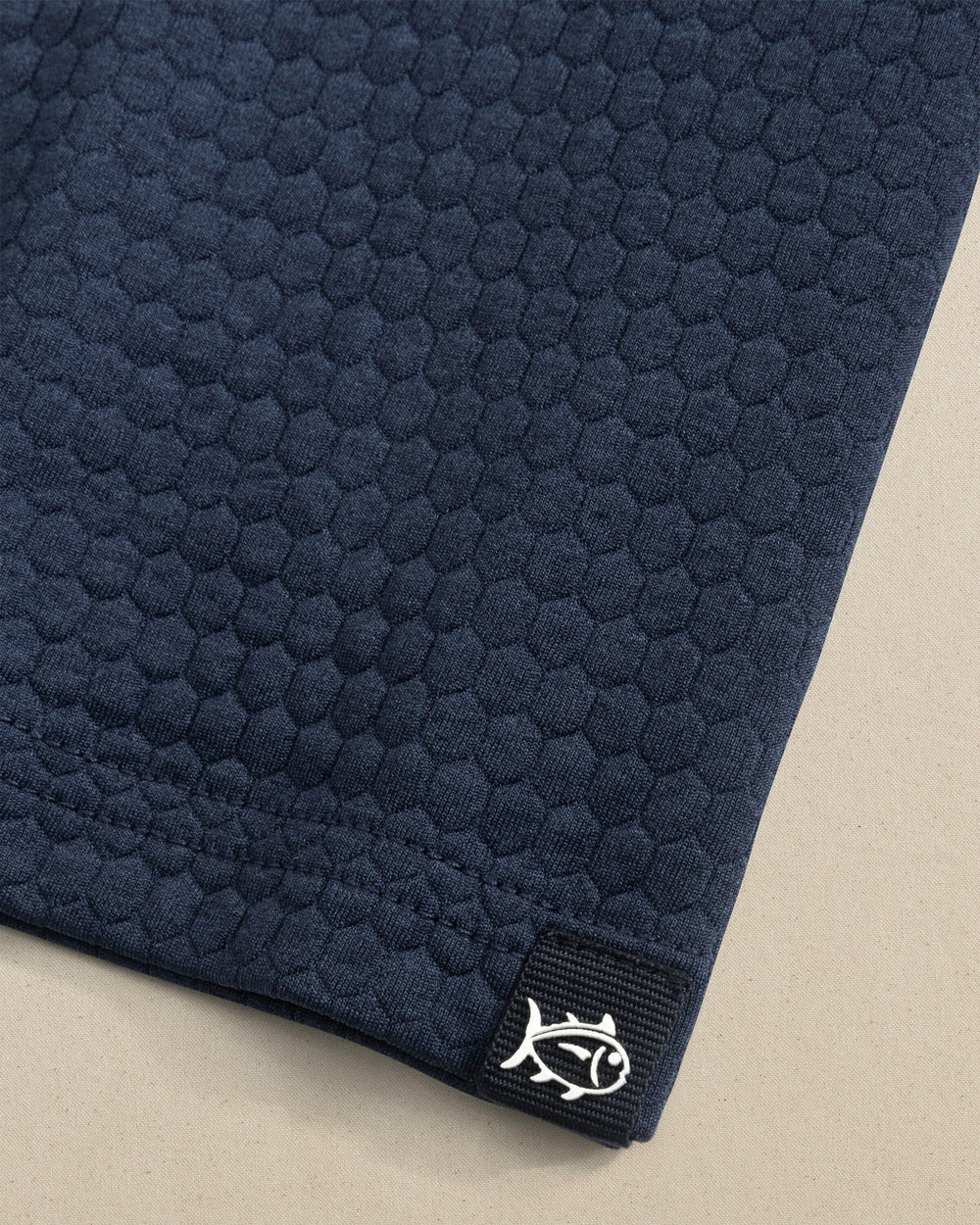 The detail view of the Southern Tide Ole Miss Rebels Boys Scuttle Hoodie by Southern Tide - Heather True Navy
