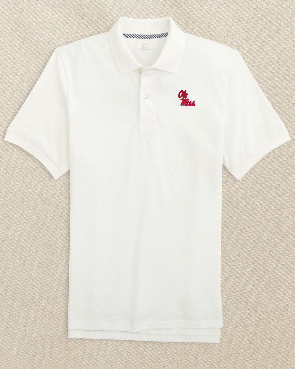 The front view of the Southern Tide Ole Miss Rebels Stacked Skipjack Polo Shirt by Southern Tide - Classic White