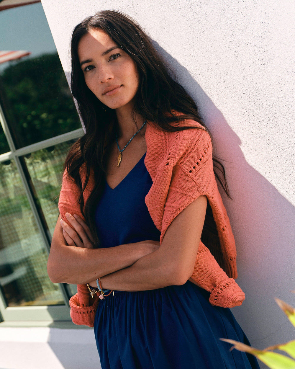 The lifestyle view of the Southern Tide Ophelia Sweater by Southern Tide - Coral Beach