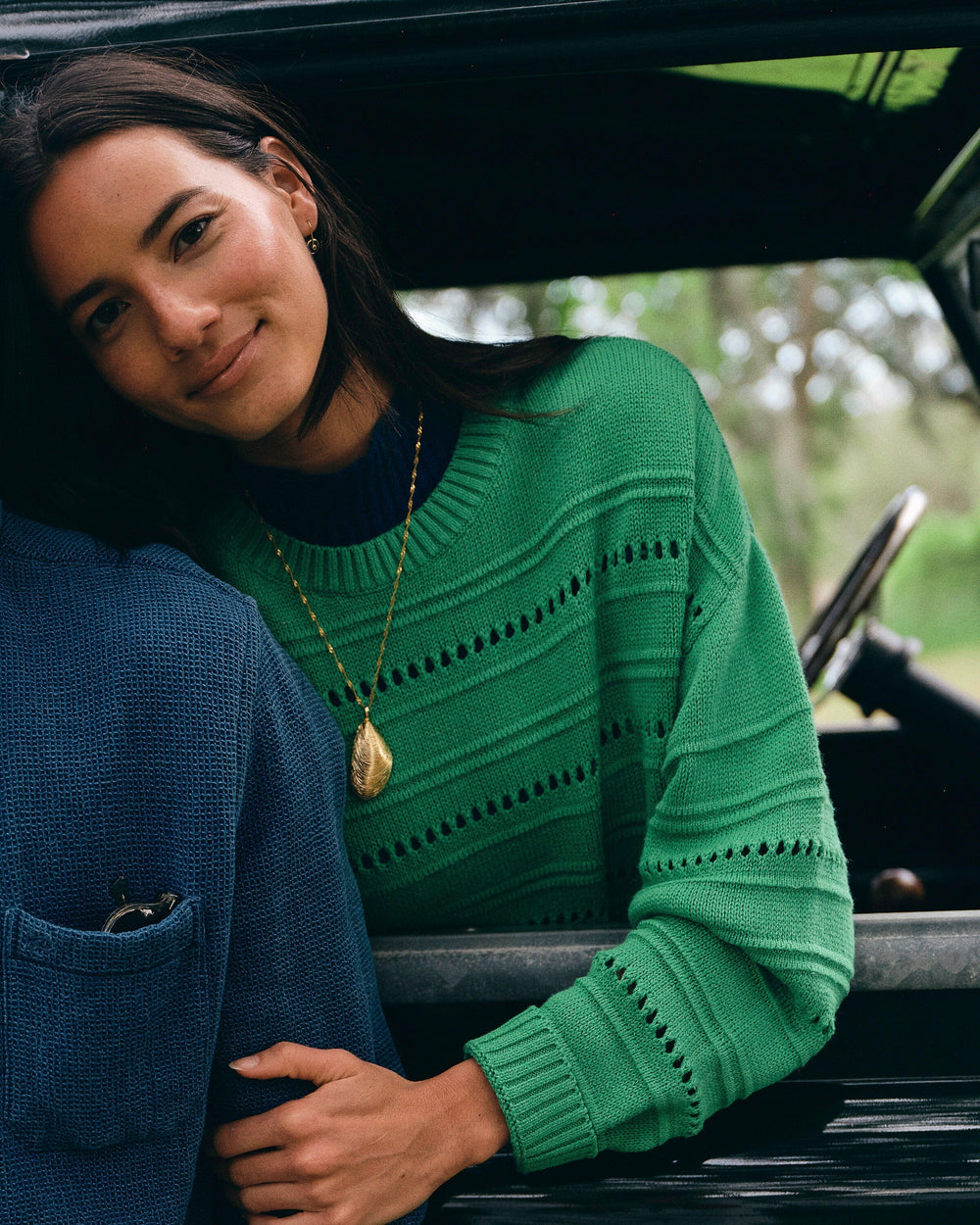 The lifestyle view of the Southern Tide Ophelia Sweater by Southern Tide - Green Spruce