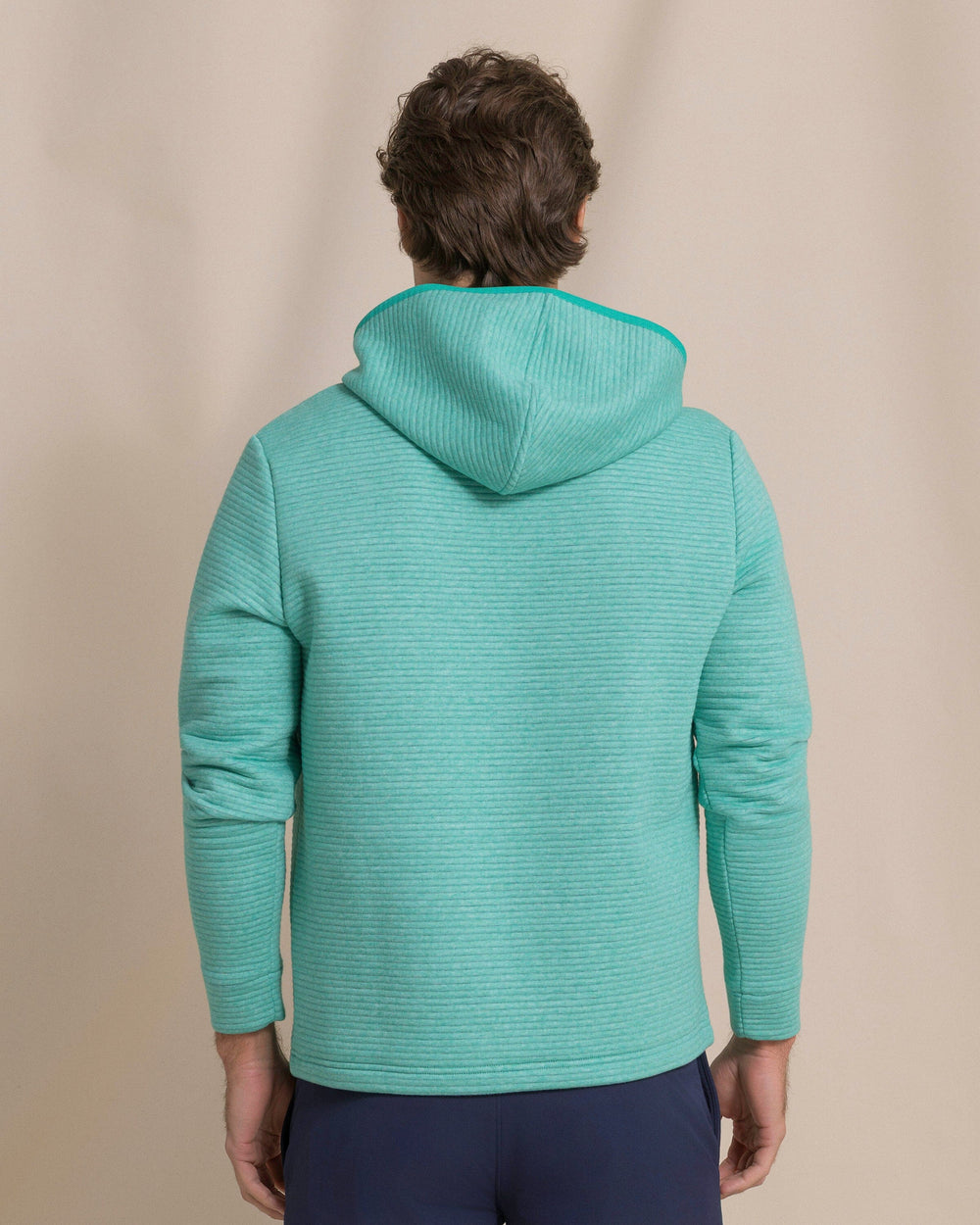 The back view of the Southern Tide Ottoman Heather Quarter Zip Hoodie by Southern Tide - Heather Persian Green