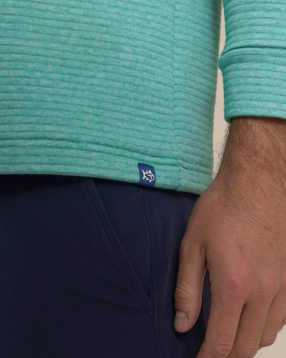 The detail view of the Southern Tide Ottoman Heather Quarter Zip Hoodie by Southern Tide - Heather Persian Green