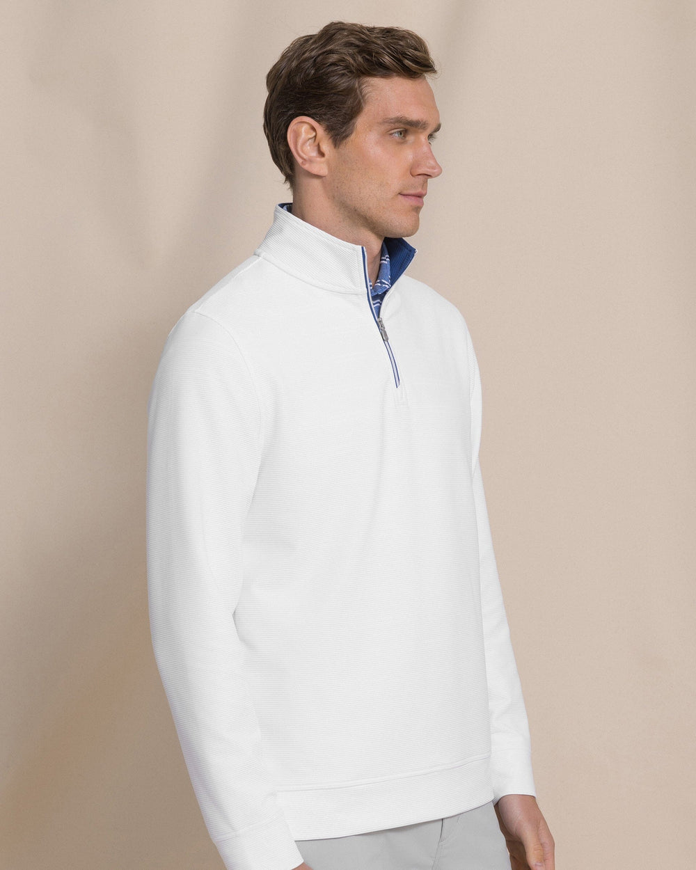 The side view of the Southern Tide Ottoman Quarter Zip by Southern Tide - Classic White