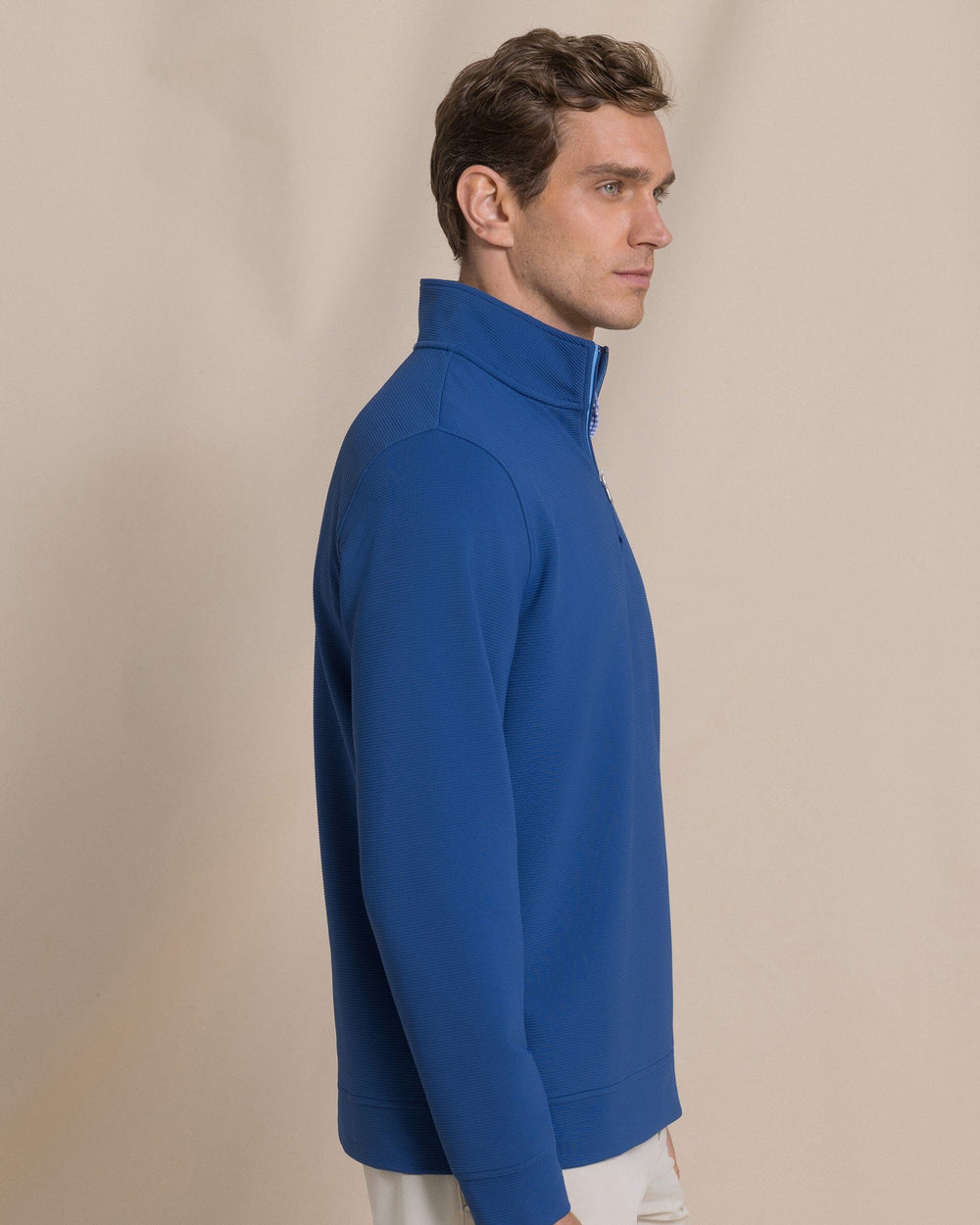 The side view of the Southern Tide Ottoman Quarter Zip by Southern Tide - Nautical Blue