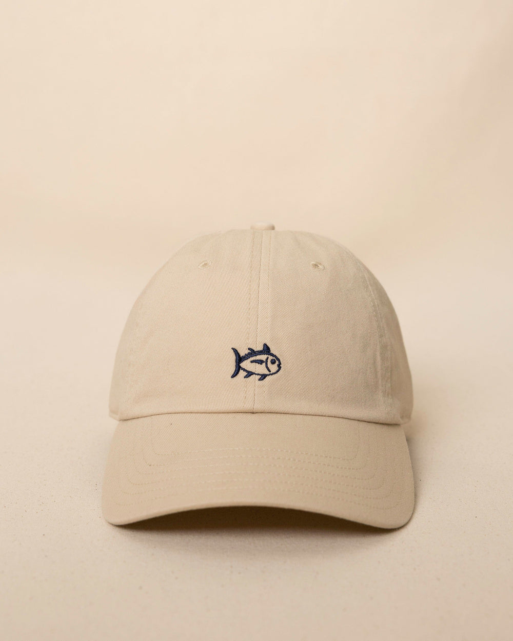 The front view of the Southern Tide Outline Skipjack Leather Strap Hat by Southern Tide - Sand Dune