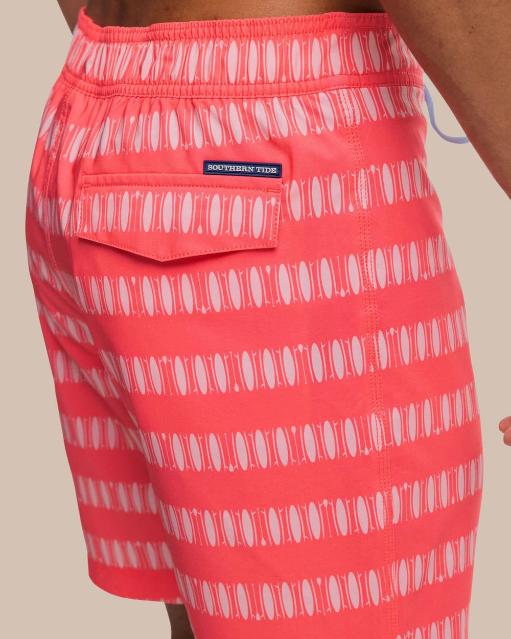 The detail view of the Southern Tide Paddlin Out Printed Swim Short by Southern Tide - Sunkist Coral