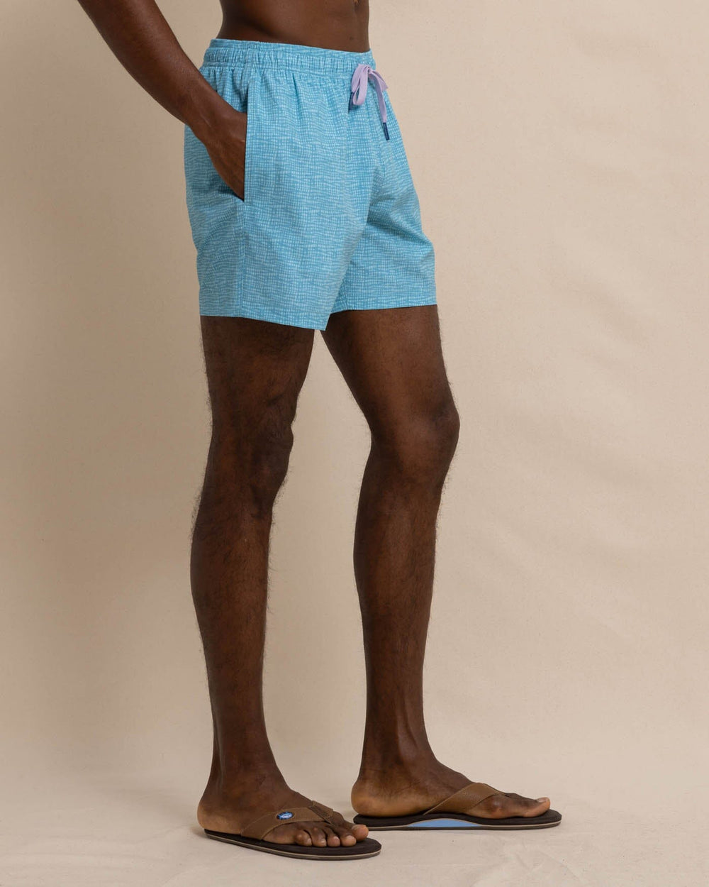 The front view of the Southern Tide Painted Check Swim Trunk by Southern Tide - Wake Blue