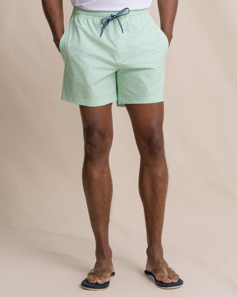 The front view of the Southern Tide Palmy Vibes Maritime Swim Trunk by Southern Tide - Green Ash