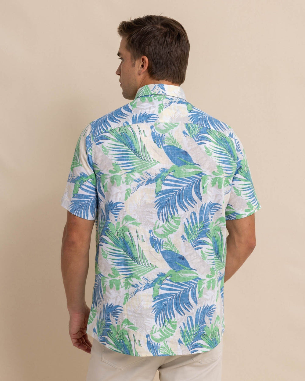 The back view of the Southern Tide Paradise Palms Linen Rayon Short Sleeve Sport Shirt by Southern Tide - Classic White