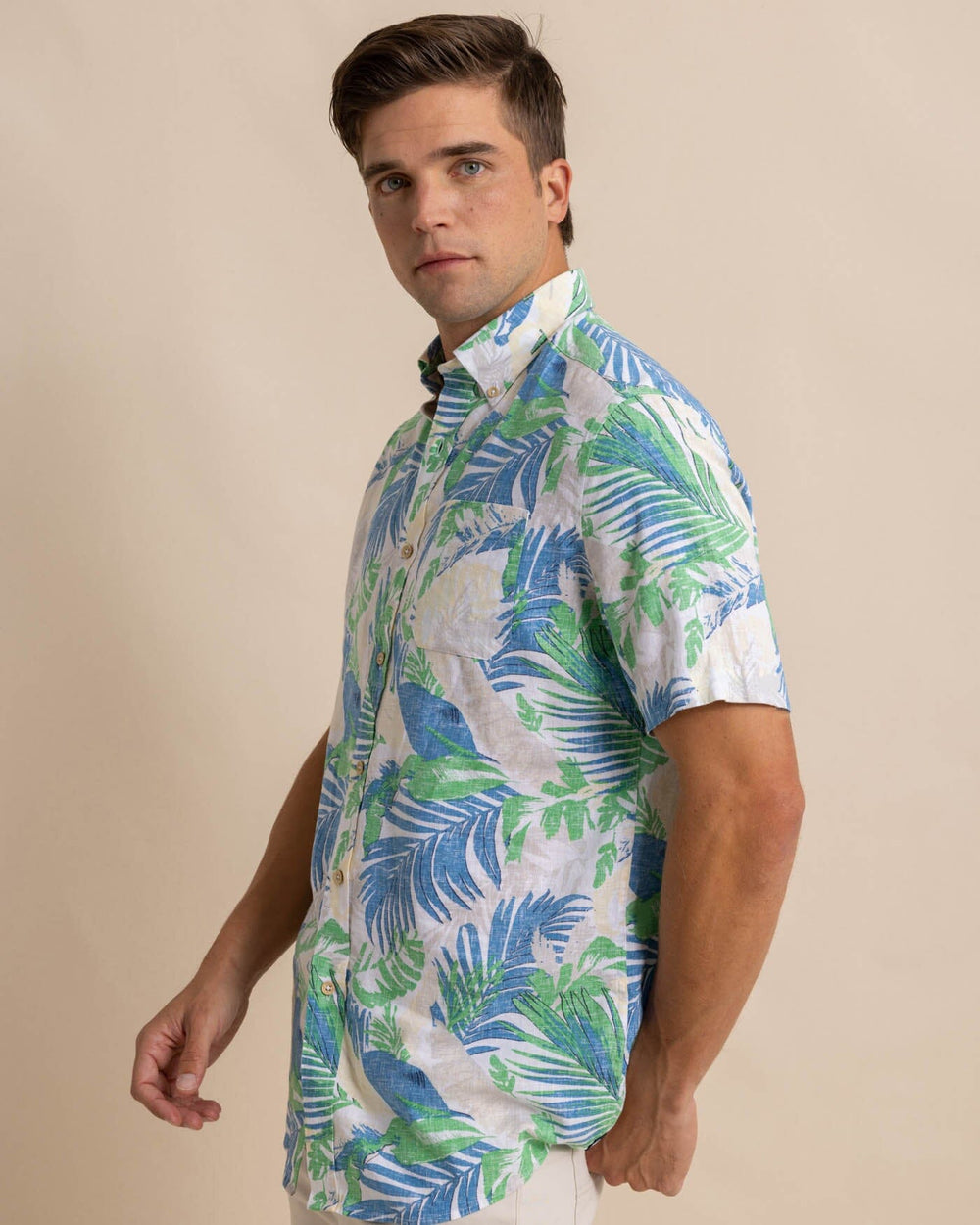 The front view of the Southern Tide Paradise Palms Linen Rayon Short Sleeve Sport Shirt by Southern Tide - Classic White