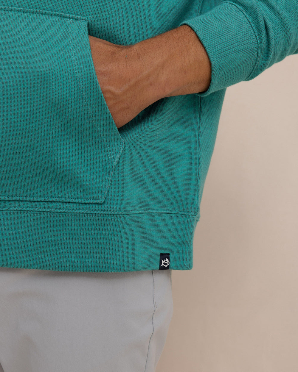 The detail view of the Southern Tide Pearl Cove Fleece Hoodie by Southern Tide - Spruce Shade