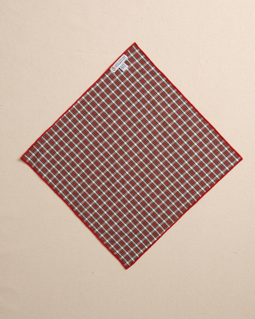 The back view of the High Cotton Peppermint Plaid Cotton Pocket Square at Southern Tide - Red