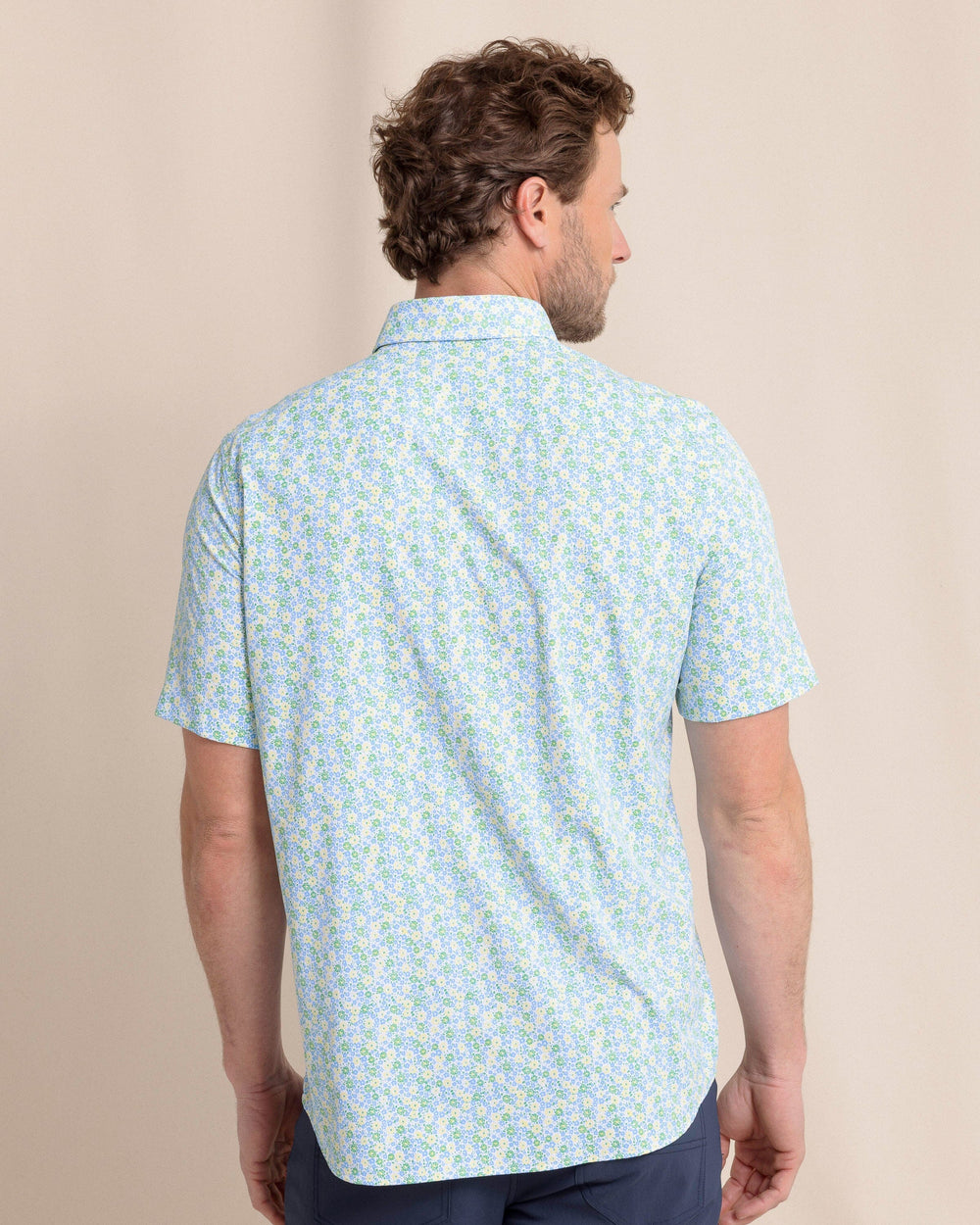 The back view of the Southern Tide Petal Party Intercoastal Short Sleeve Sport Shirt by Southern Tide - Tuscan Sun