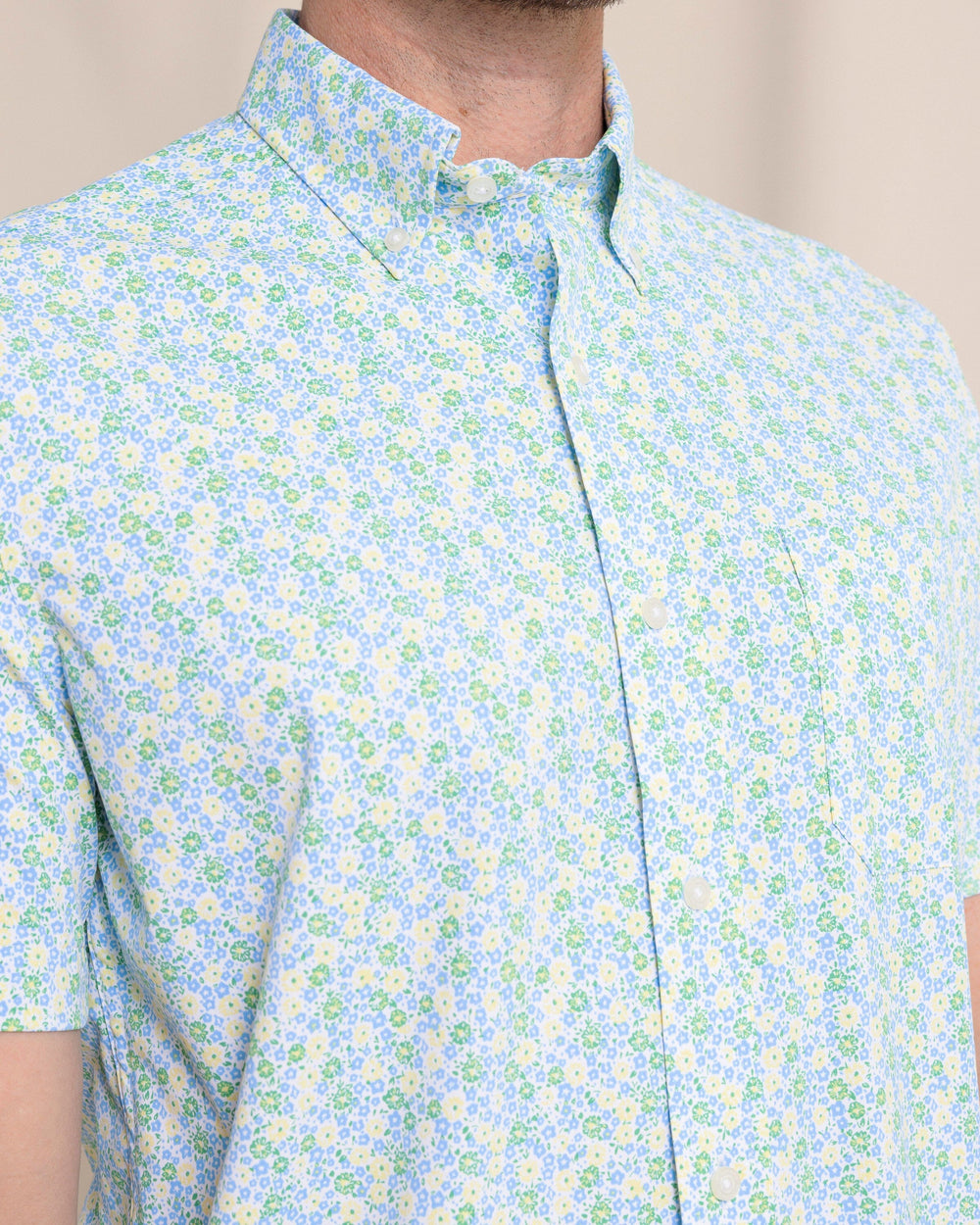 The front detail view of the Southern Tide Petal Party Intercoastal Short Sleeve Sport Shirt by Southern Tide - Tuscan Sun