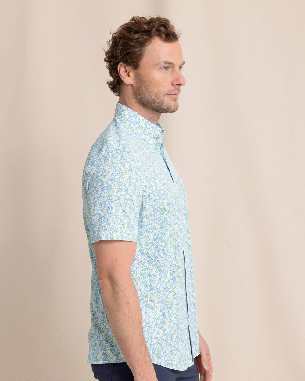 The side view of the Southern Tide Petal Party Intercoastal Short Sleeve Sport Shirt by Southern Tide - Tuscan Sun