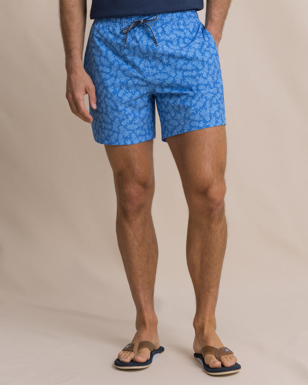 The front view of the Southern Tide Pineapple Parade Maritime Swim Trunk by Southern Tide - Blue Stream