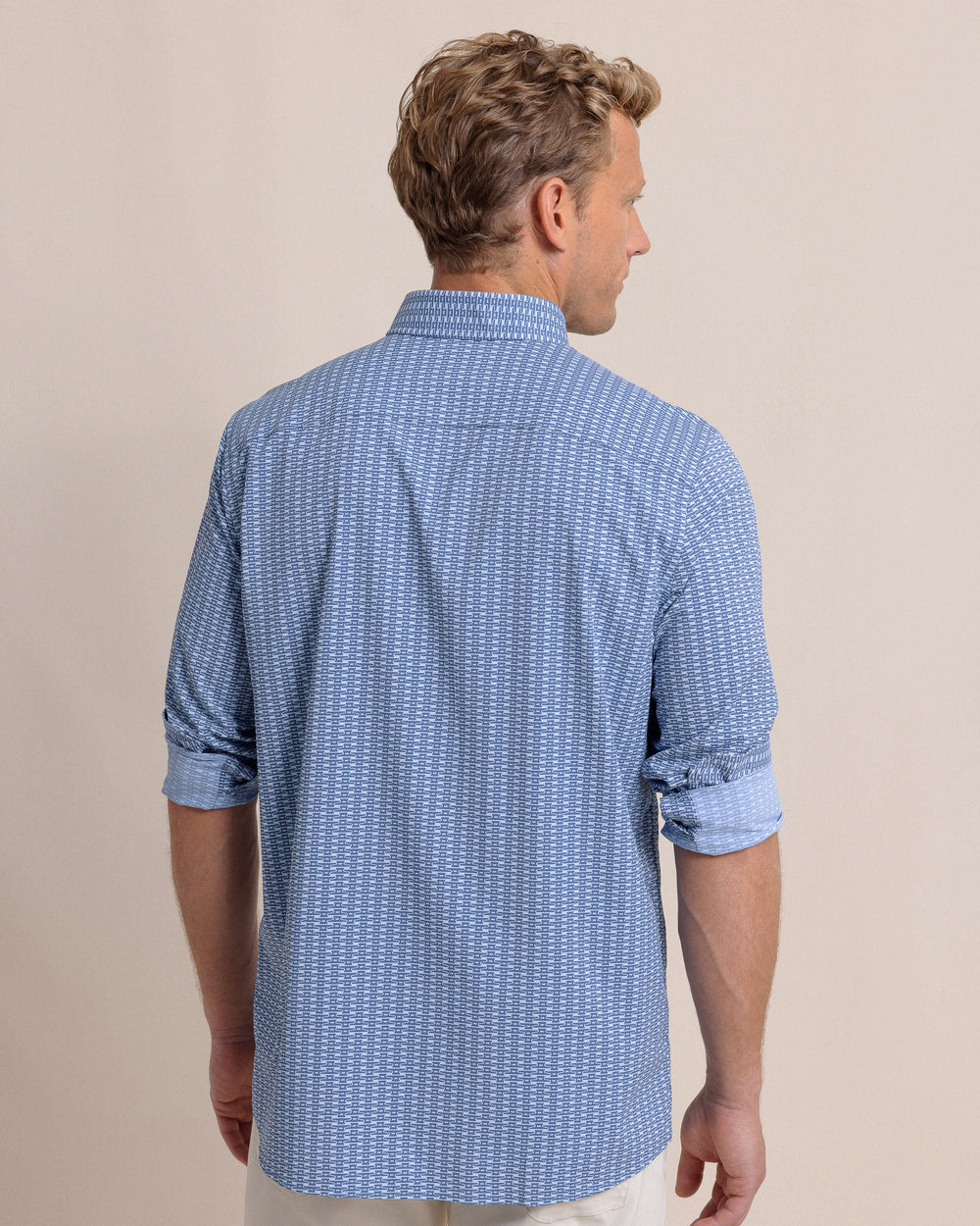 The back view of the Southern Tide Pop Lock and Dock It Intercoastal Long Sleeve Sport Shirt by Southern Tide - Light Indigo