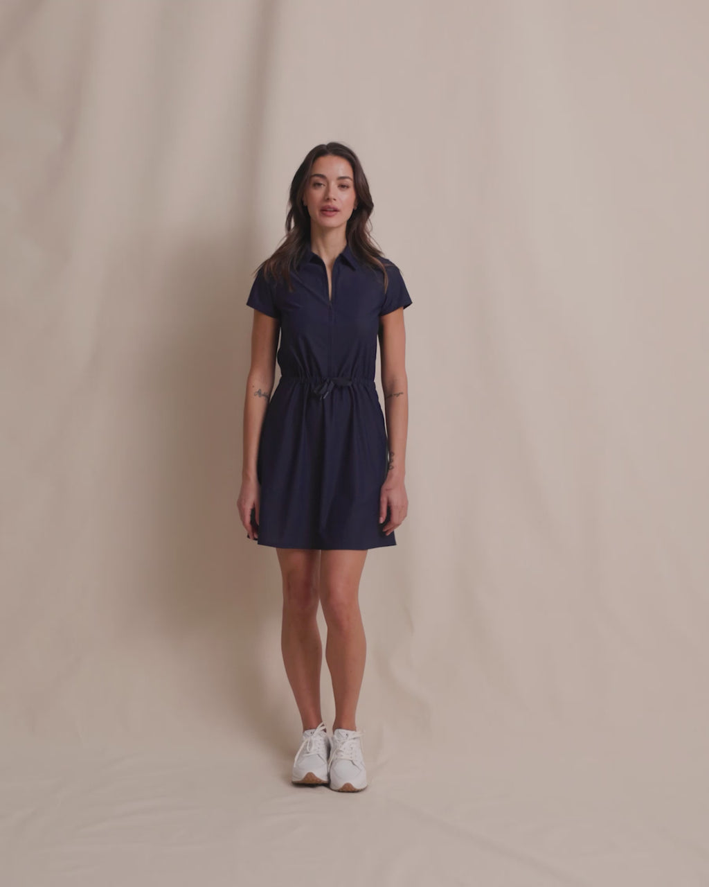 The video view of the Southern Tide Bailee Short Sleeve Performance Dress by Southern Tide - Dress Blue