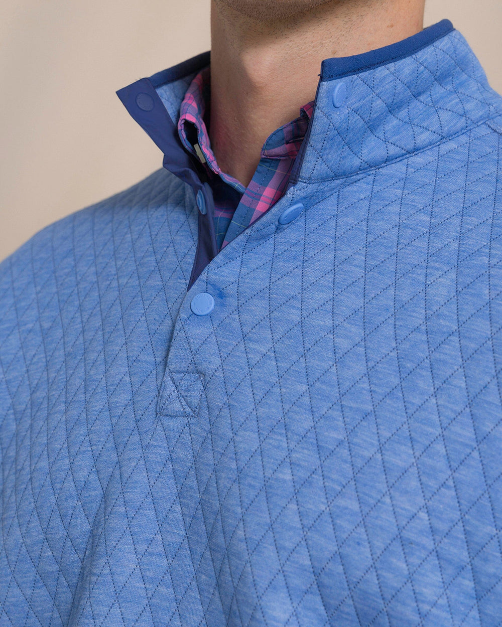 The detail view of the Southern Tide Quilted Heather Reversible Quarter Snap by Southern Tide - Heather Ocean Channel