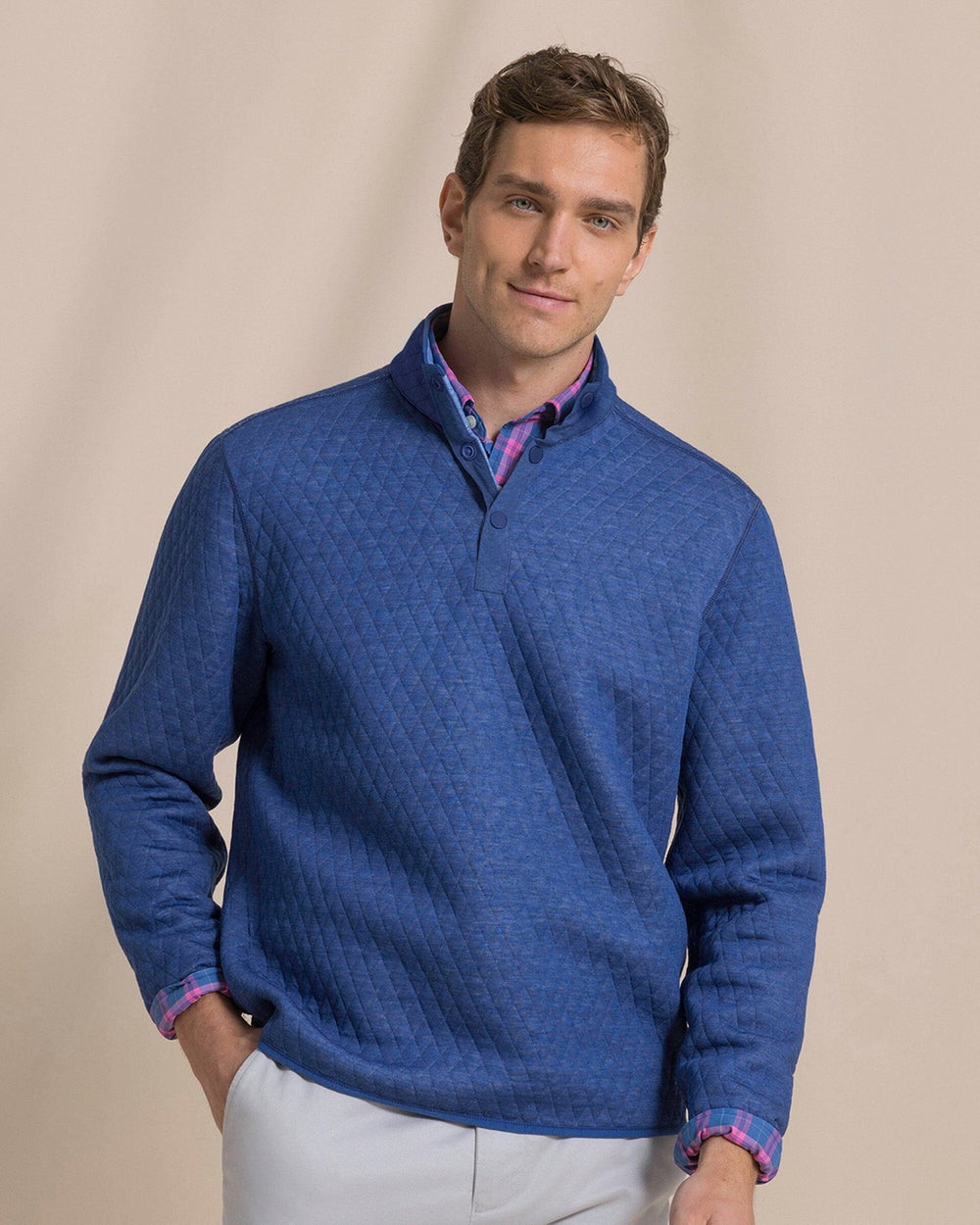 The front view of the Southern Tide Quilted Heather Reversible Quarter Snap by Southern Tide - Heather Ocean Channel