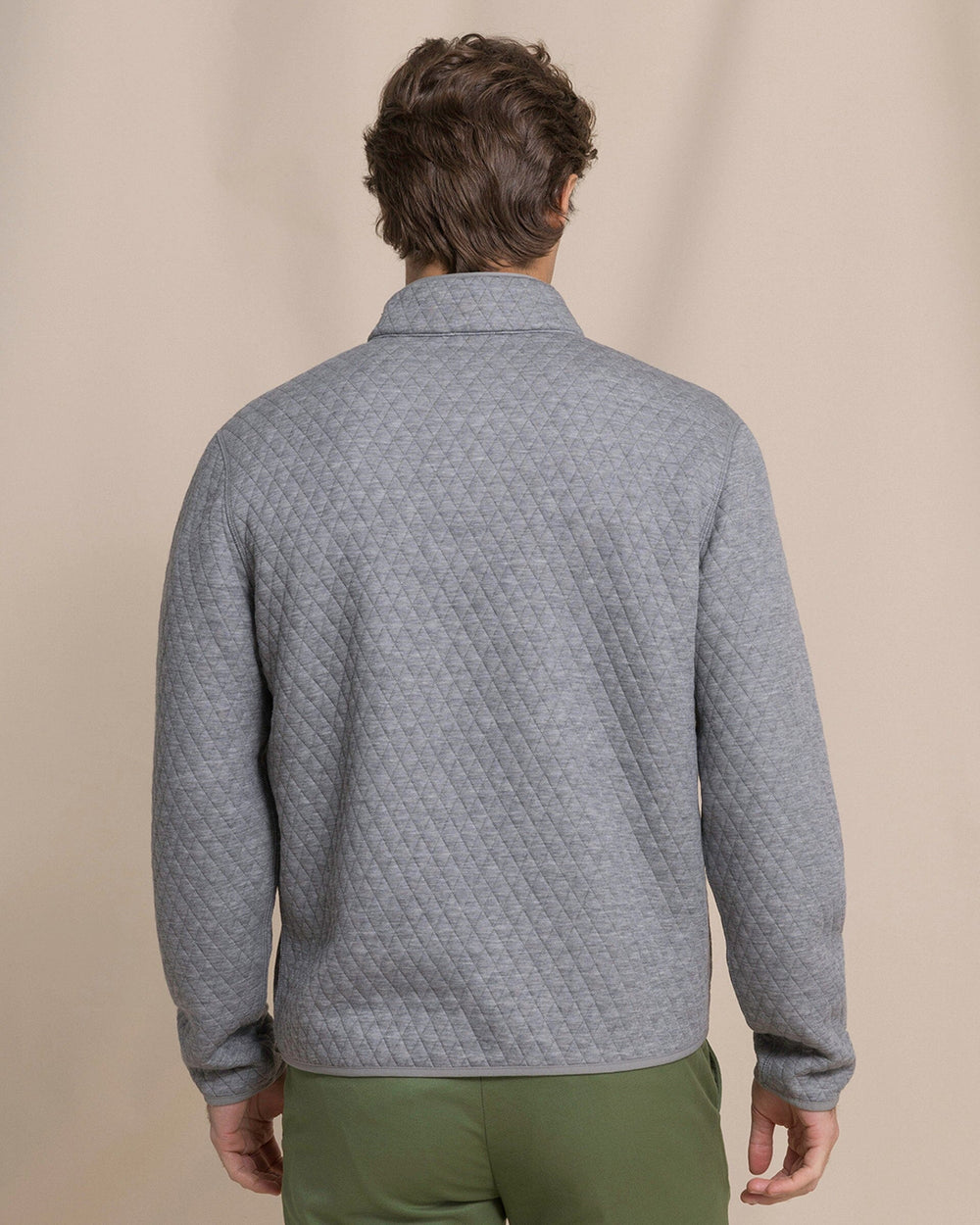 The back view of the Southern Tide Quilted Heather Reversible Quarter Snap by Southern Tide - Heather Steel Grey