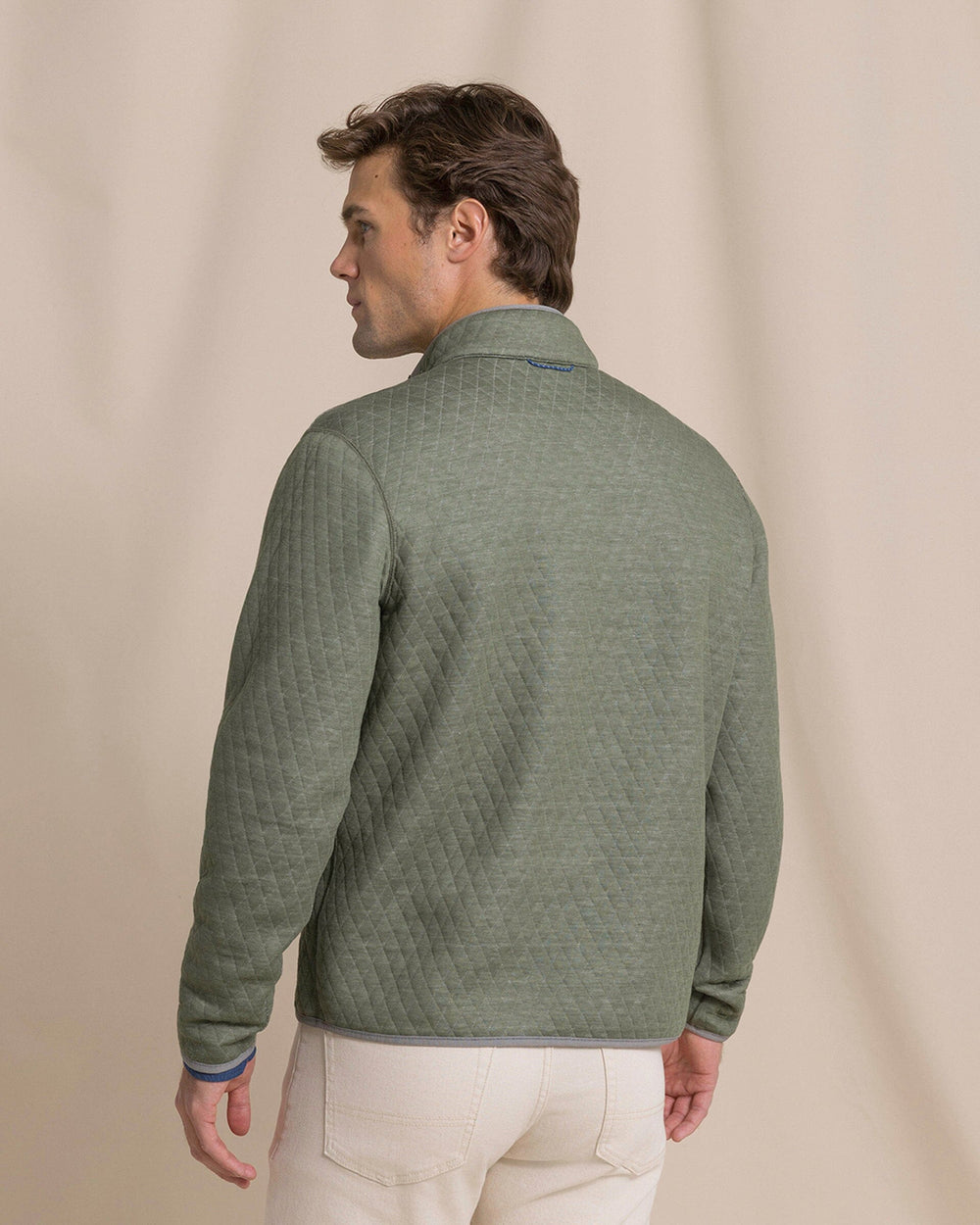 The back view of the Southern Tide Quilted Heather Reversible Quarter Snap by Southern Tide - Heather Steel Grey