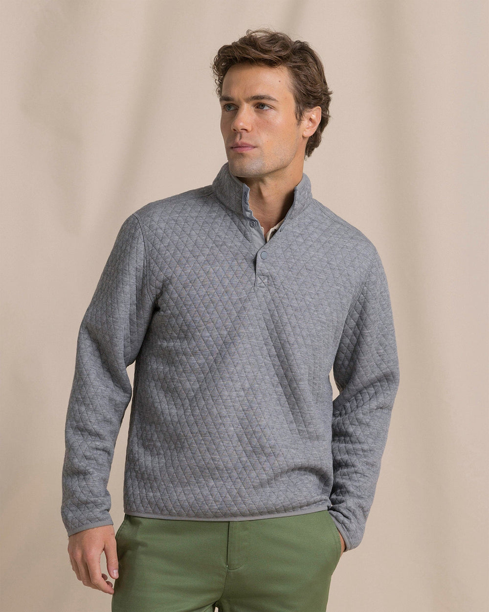 The front view of the Southern Tide Quilted Heather Reversible Quarter Snap by Southern Tide - Heather Steel Grey