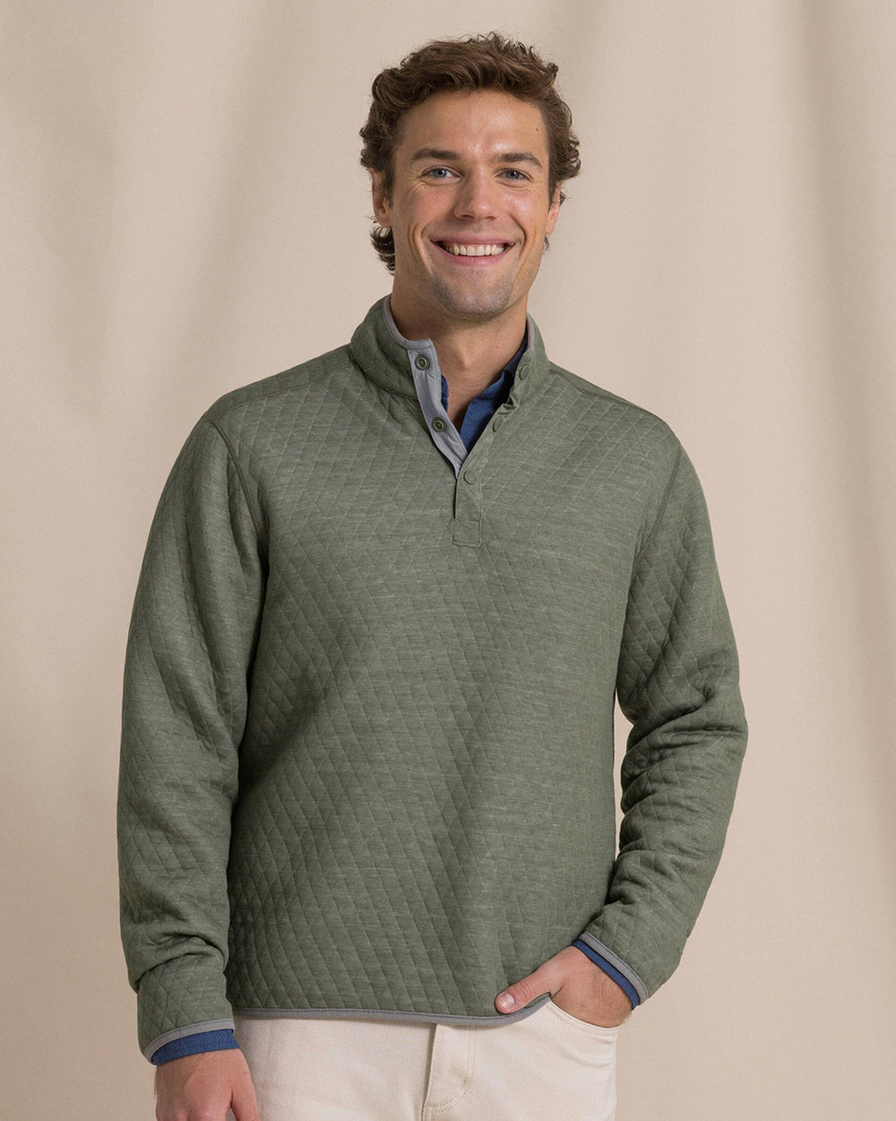 The front view of the Southern Tide Quilted Heather Reversible Quarter Snap by Southern Tide - Heather Steel Grey