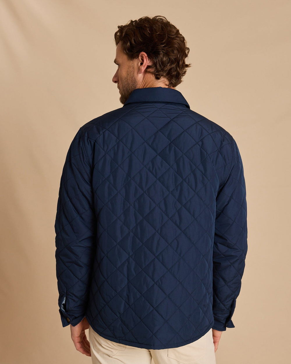 The back view of the Southern Tide Quilted Jacket by Southern Tide - Dress Blue