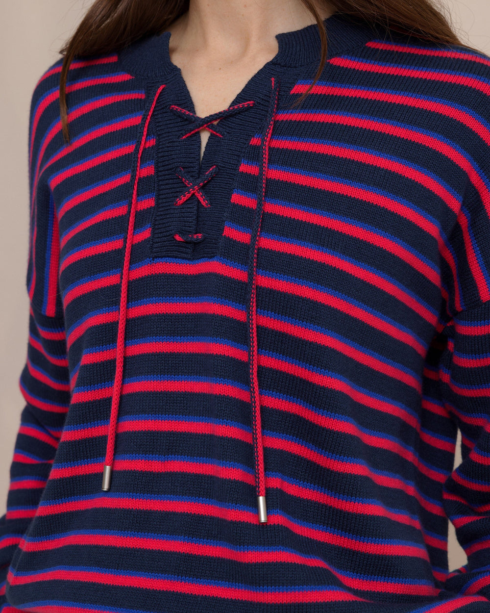 The detail view of the Southern Tide Raelyn Tie Neck Sweater by Southern Tide - Grenadine Red