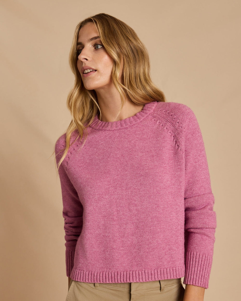 The front view of the Southern Tide Raglan Crewneck Sweater by Southern Tide - Deep Orchid