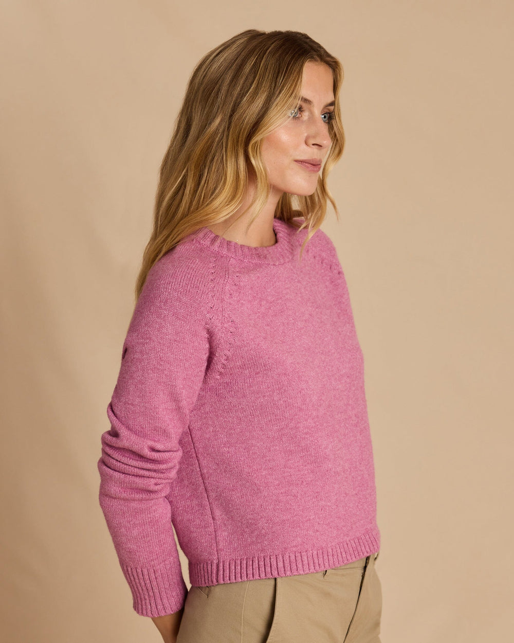 The side view of the Southern Tide Raglan Crewneck Sweater by Southern Tide - Deep Orchid