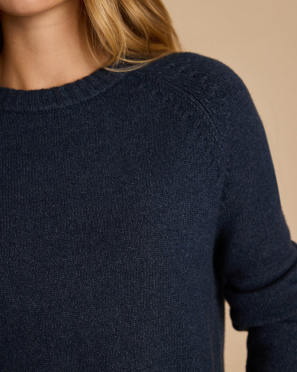 The detail view of the Southern Tide Raglan Crewneck Sweater by Southern Tide - Dress Blue