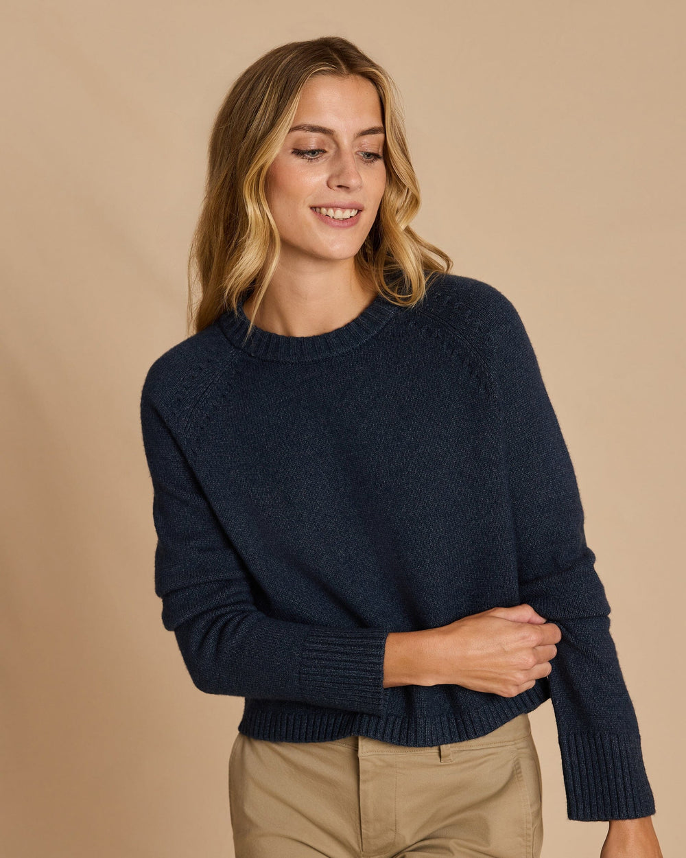 The front view of the Southern Tide Raglan Crewneck Sweater by Southern Tide - Dress Blue