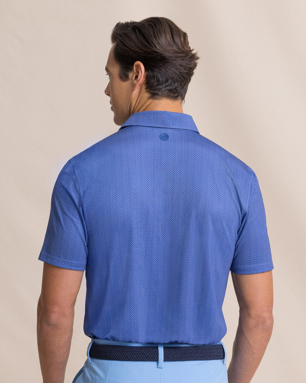The back view of the Southern Tide Driver Raise The Par Printed Polo by Southern Tide - Nautical Blue