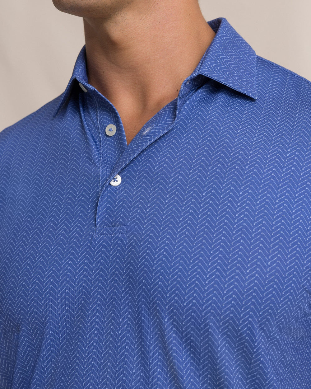 The detail view of the Southern Tide Driver Raise The Par Printed Polo by Southern Tide - Nautical Blue