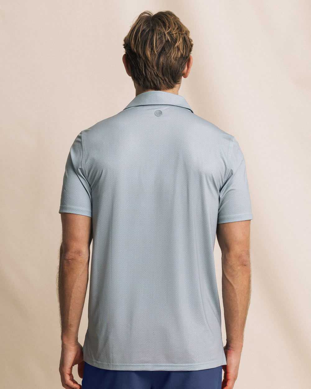 The back view of the Southern Tide Driver Raise The Par Printed Polo by Southern Tide - Steel