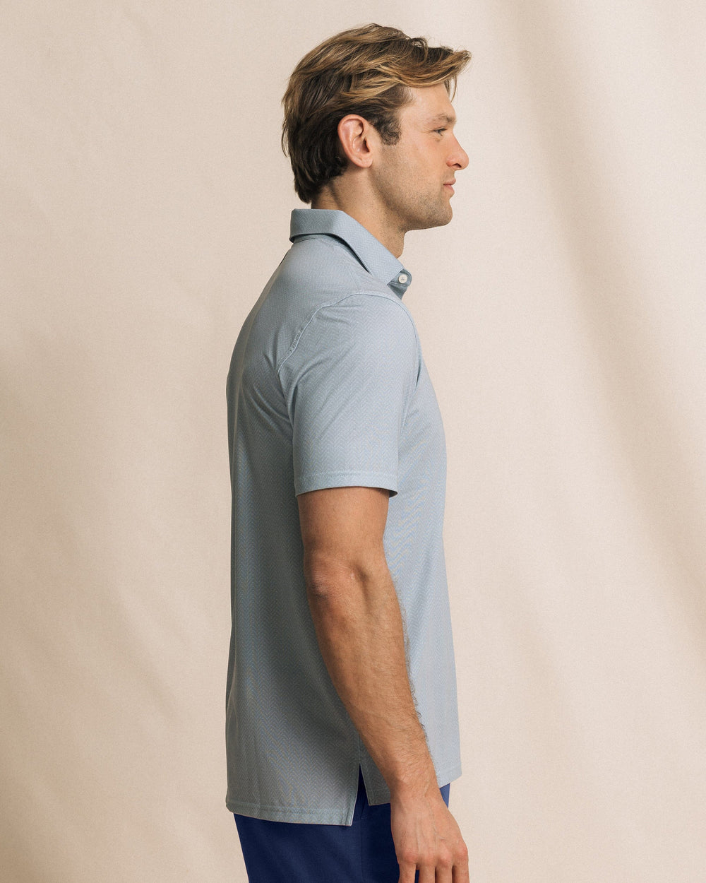 The side view of the Southern Tide Driver Raise The Par Printed Polo by Southern Tide - Steel