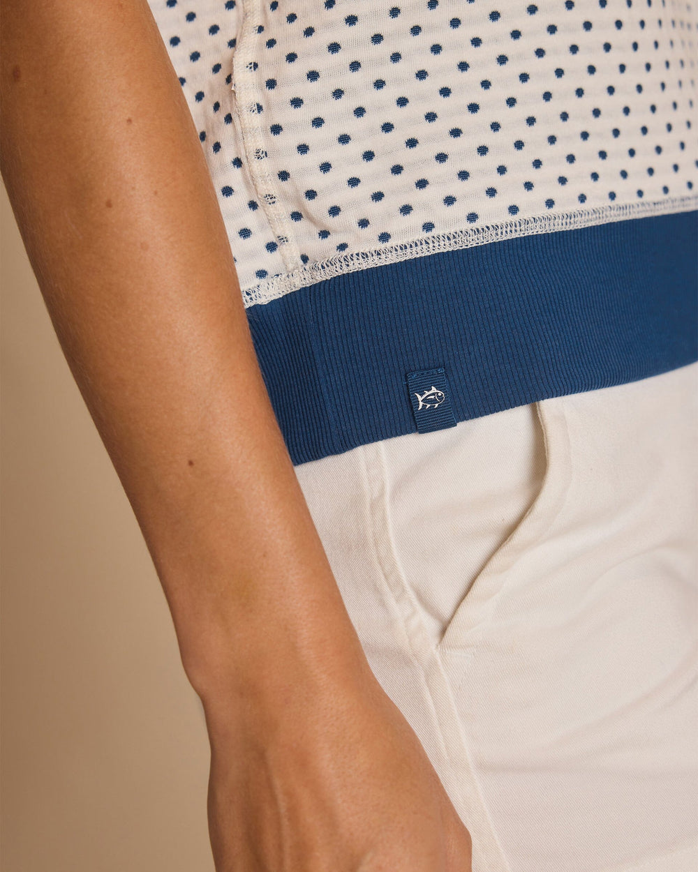 The detail view of the Southern Tide Reversible Stripe and Dot Top by Southern Tide - Star White