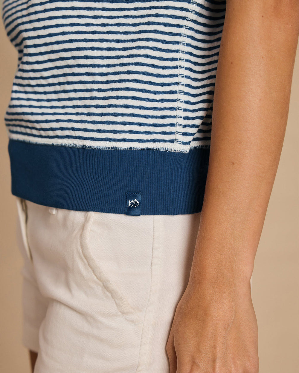 The detail view of the Southern Tide Reversible Stripe and Dot Top by Southern Tide - Star White