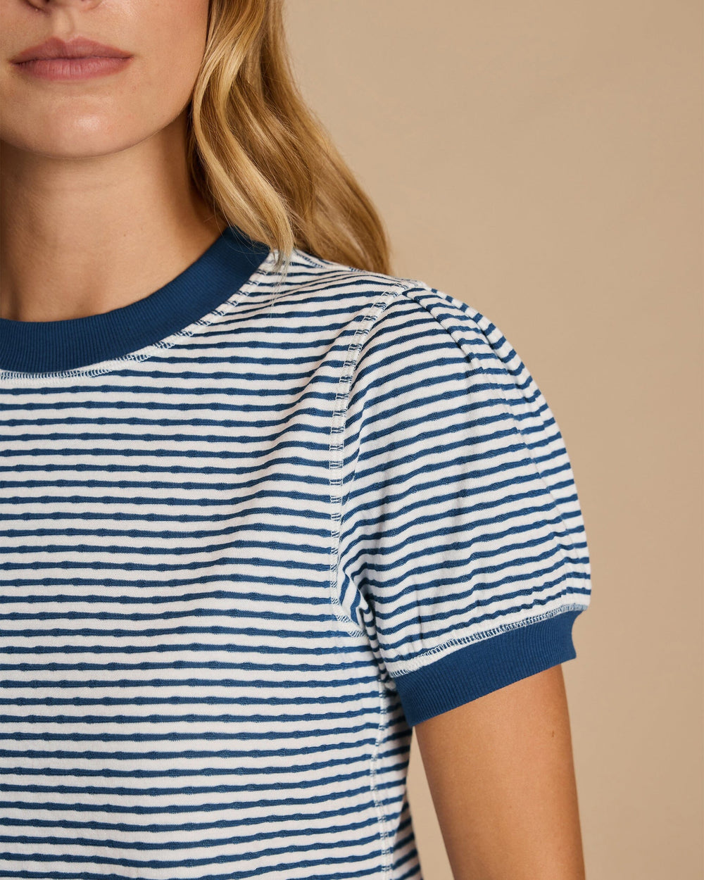 The detail view of the Southern Tide Reversible Stripe and Dot Top by Southern Tide - Star White